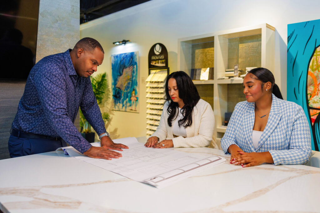 The Lifestyle Design Homes team reviewing custom home plans in Estero, Florida